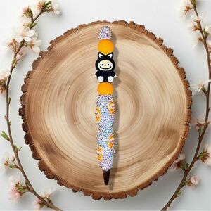 Labubu The Monsters Orange & Black Rhinestone/Acrylic Twist Pen